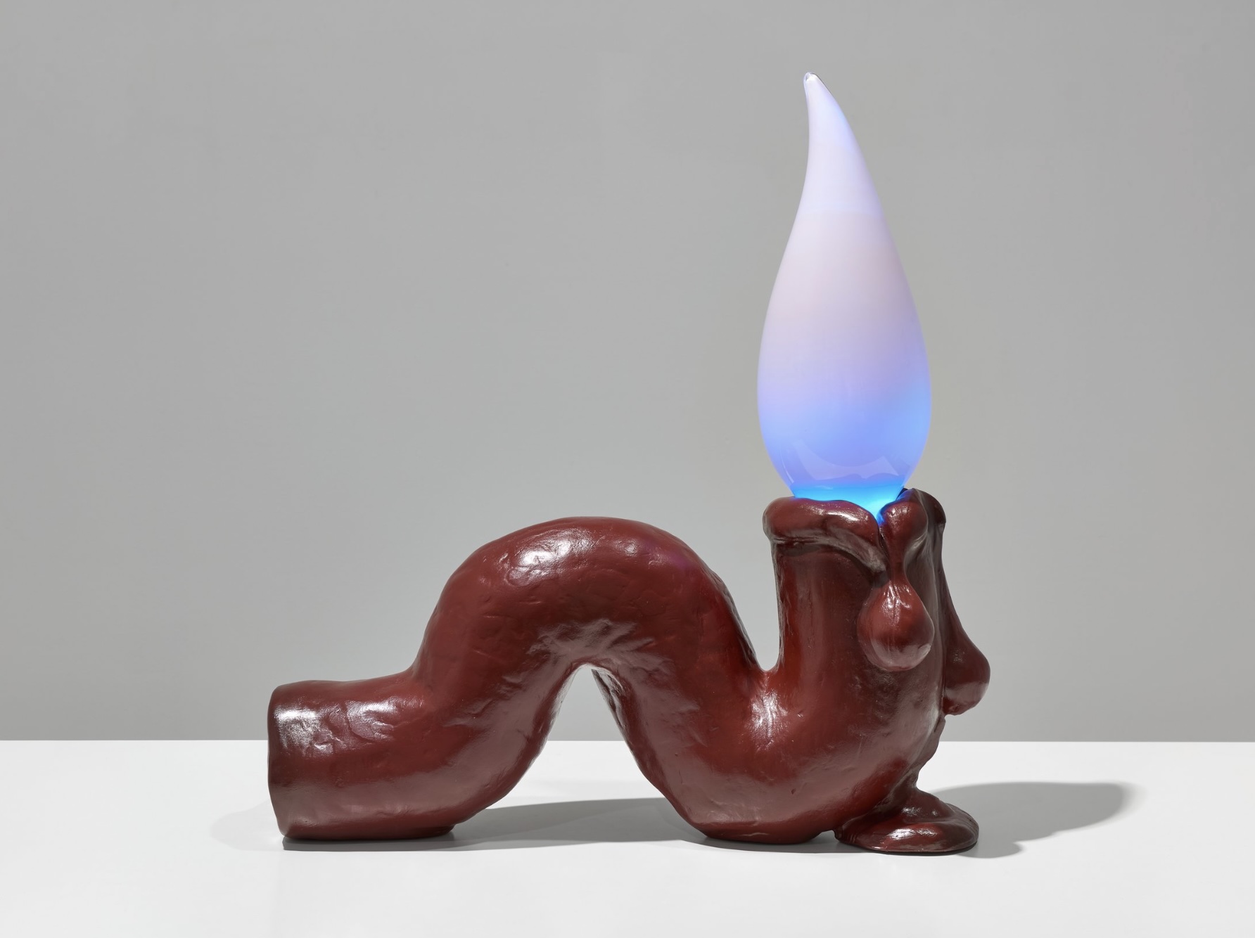 Tai Shani, Haunted by a Million Small Suns (Cardinal), an illuminated red Jesmonite sculpture